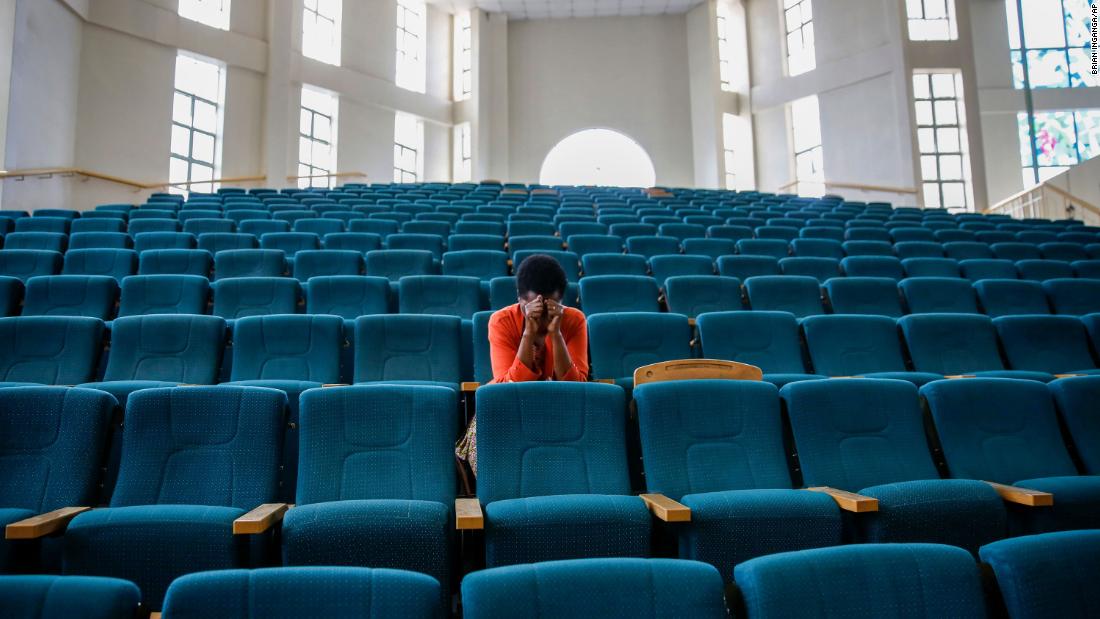 A woman attends a Sunday service at the Nairobi Baptist Church in Nairobi, Kenya, on March 22. The service was streamed live on the internet.